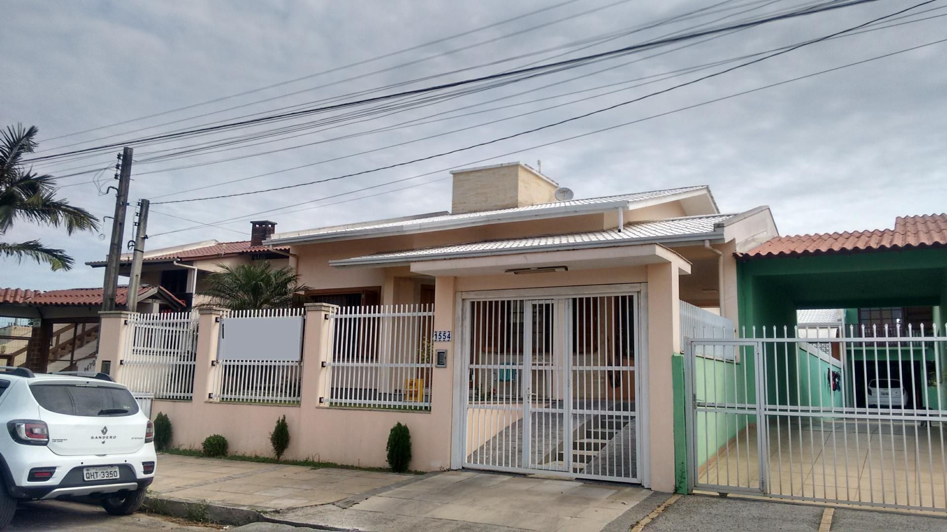 Casa com 3 dormitórios em Torres, no bairro Igra Sul à venda
