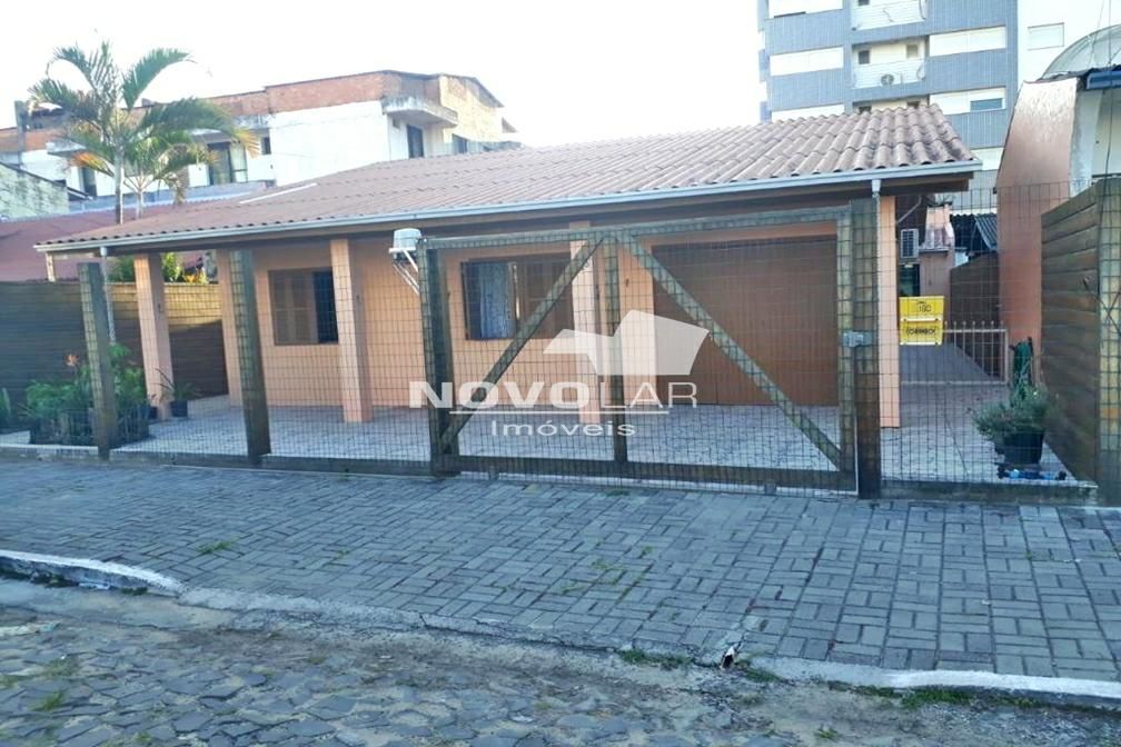 Casa com 5 dormitórios em Torres, no bairro Predial à venda