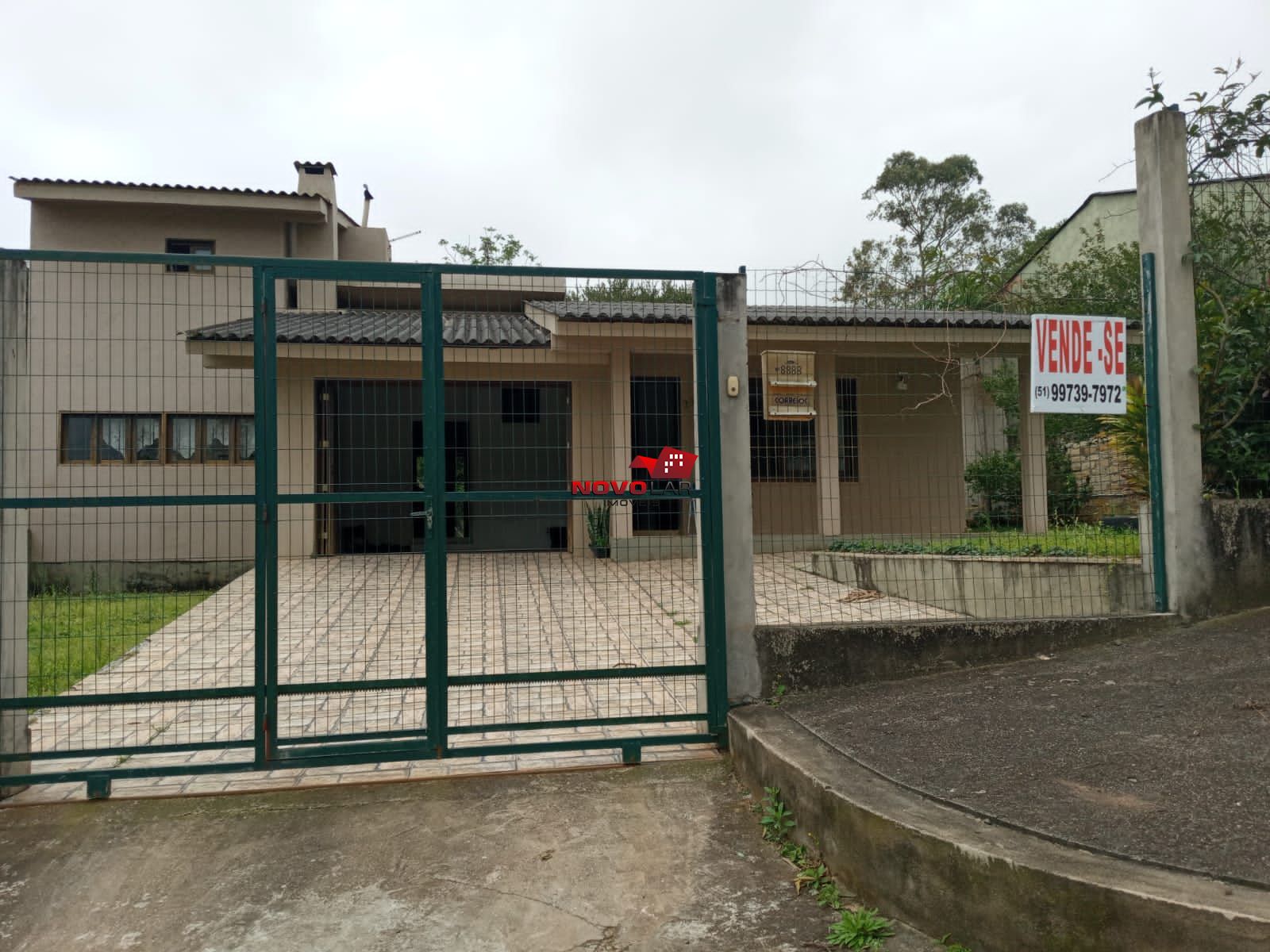 Casa com 2 dormitórios em Torres, no bairro Vila São João à venda