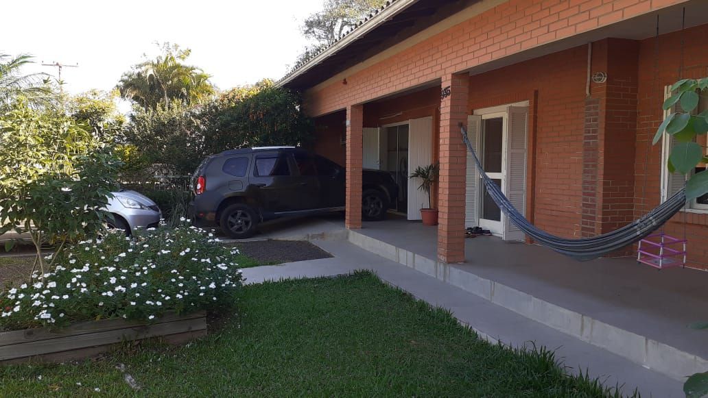 Casa com 3 dormitórios em Torres, no bairro Igra Sul à venda